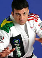Brazilian jiu-jitsu champion Carlos Machado jerking his hard cock on video!
