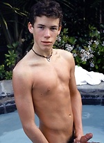 Cute twink blows a hot creamy load all over himself pool side.